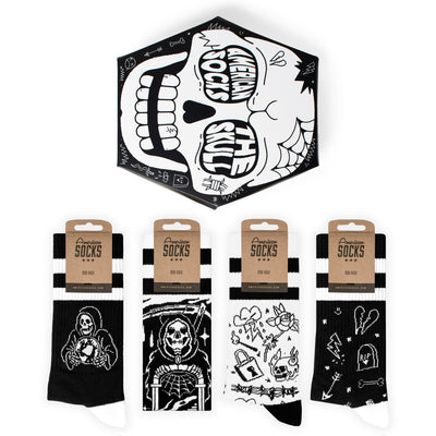 Skull shaped gift box including four death related socks with goth elements such as graves and grim reaper by american socks 