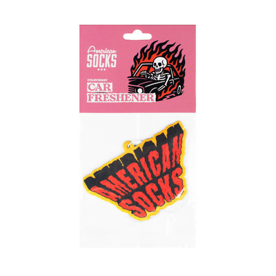 American Socks car freshener packaging with a skeleton in a car design on a pink background.