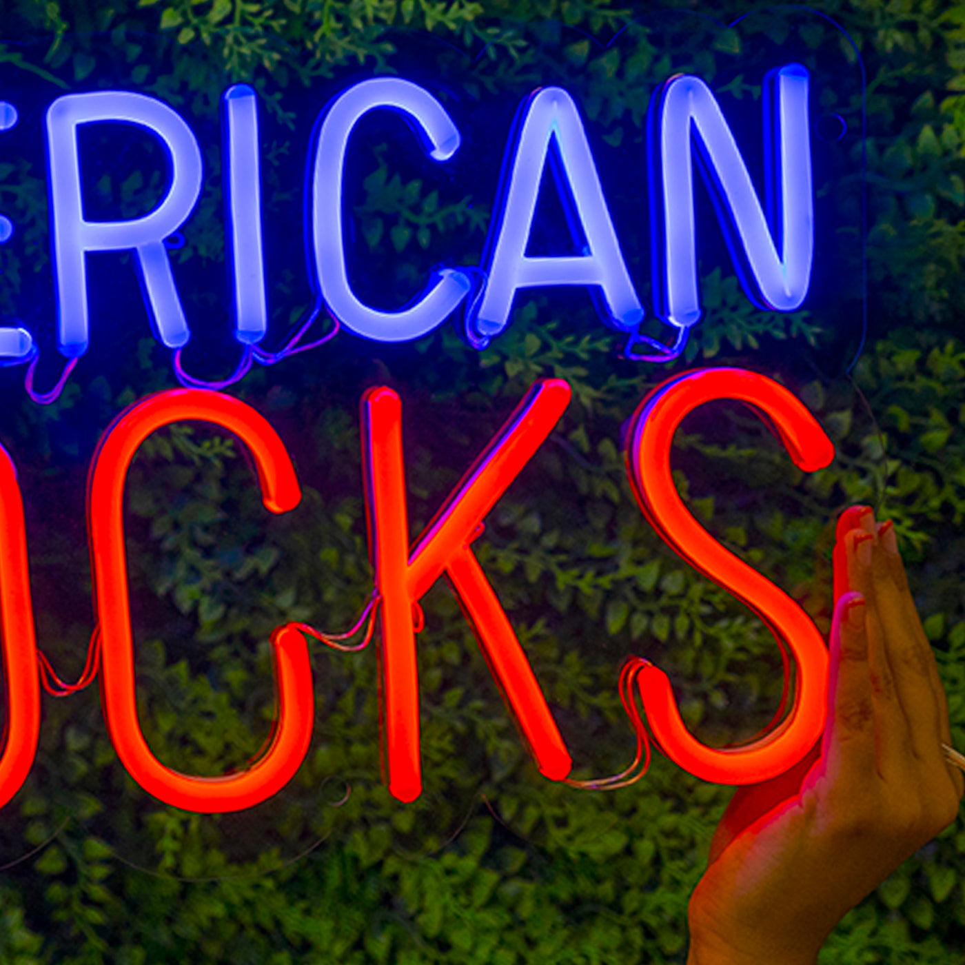Close up of american socks logo on blue and red neon sign