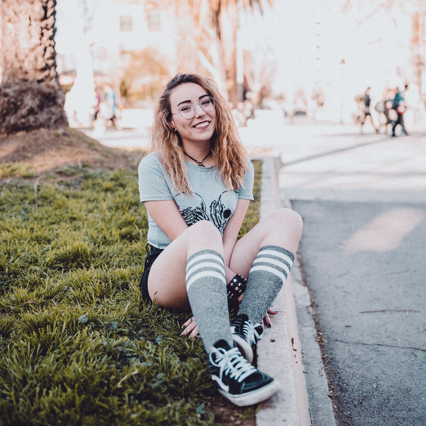Woman outdoors wearing alternative clothing and cute gray knee high socks american socks 